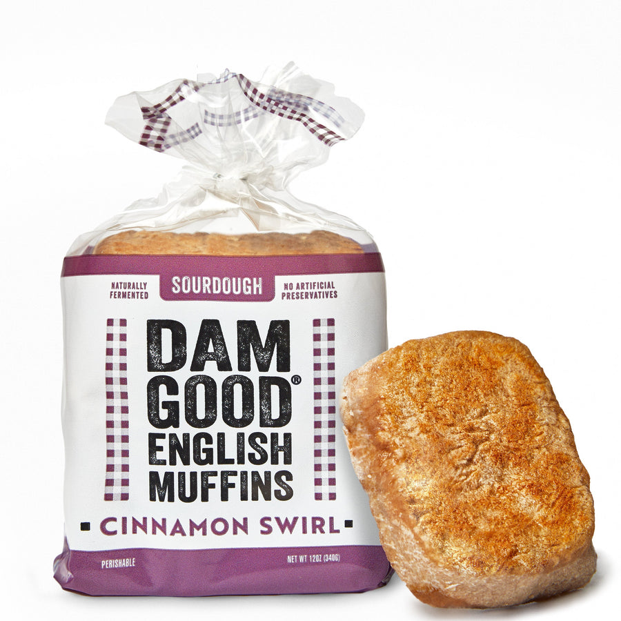 Bag of Dam Good English Muffins with a single muffin on a white background