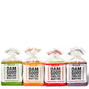 Four packages of Dam Good English Muffins in different flavors on a white background