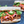 Load image into Gallery viewer, Seitan Banh Mi Sandwich on a Sourdough Whole Wheat Dam Good English Muffin
